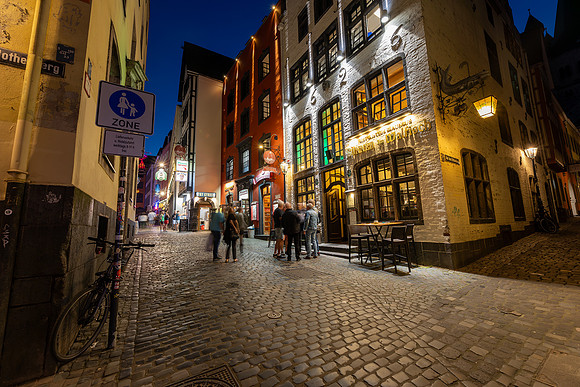 Cologne at night with people